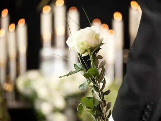 Candles and a white rose